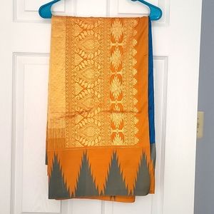 Beautiful turquoise blue (peacock blue) colored silk saree with temple border.